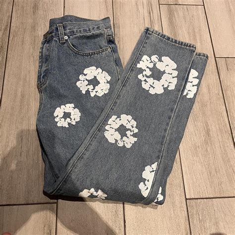 Denim Tears jeans with floral pattern - Depop