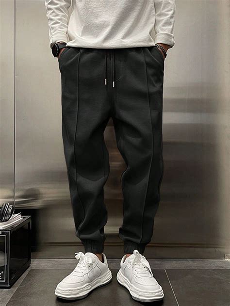 Men'S Solid Color Jogger Pants With Slanted Pockets And Elastic Cuffs ...