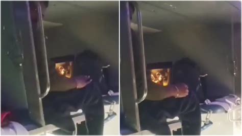 Woman records video of creepy guy staring at her on Indian Railways ...