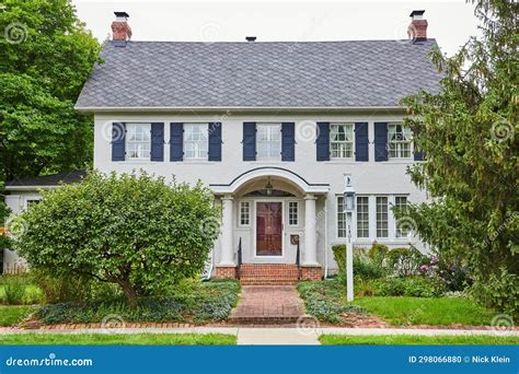 Midwest American Large White House with Blue Shutters and Mahogany Door ...
