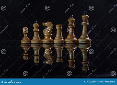 White Chess Pieces Arranged in a Row of Importance Stock Photo - Image ...