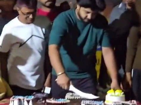 A young man from Petlad celebrated his birthday by cutting a cake with ...
