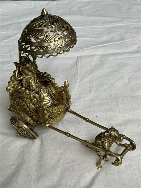 Ganesha on a rath/ chariot pulled by mooshika - brass dokra hand craft ...