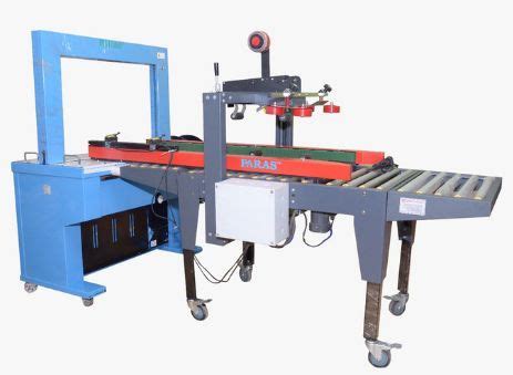 Automatic Cartoon Strapping Tapping Machine Supplier from Hapur