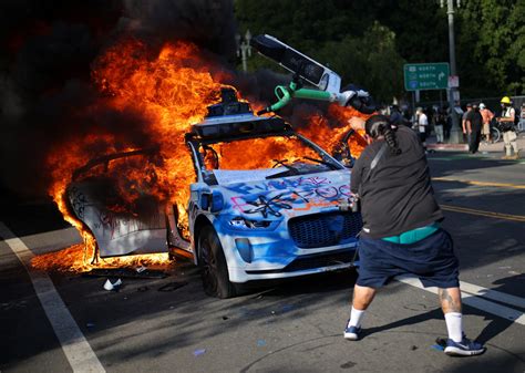 LA protests: See police using 'less lethal' weapons.