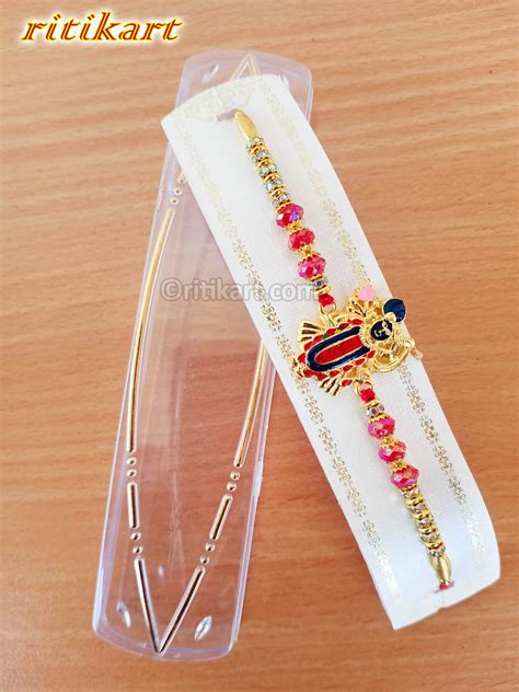 Send Online Religious Lord Krishna Golden Rakhi -Ritikart