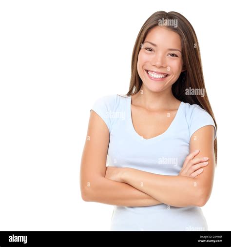 Portrait of happy mixed-race Asian / Caucasian woman in light blue t ...