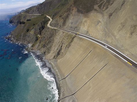 First cars whiz along California’s new Highway 1 coastal road at Big Sur