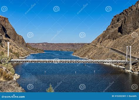 The One-lane Bridge Spans the Deschutes River Flowing between Steep ...