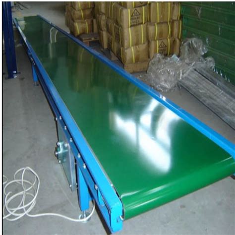 Conveyors - Packing Conveyor With Sitting Platform Manufacturer from Noida