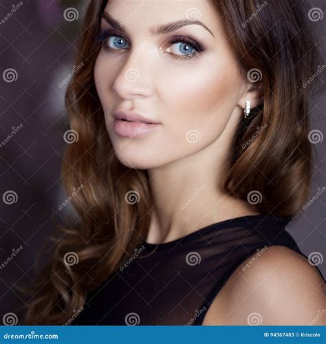 Beautiful Brunette with Blue Eyes. Portrait in the Studio, on the ...