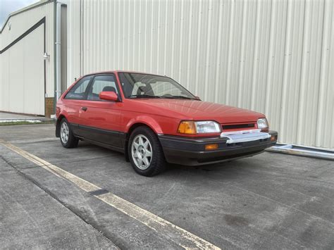 1988 Mazda 323 GTX at Kissimmee 2021 as E161 - Mecum Auctions