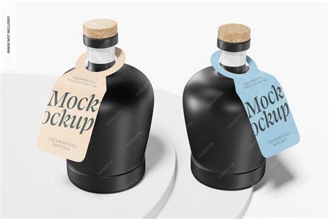 Premium PSD | Liquor bottles with hanging tag mockup, on podium