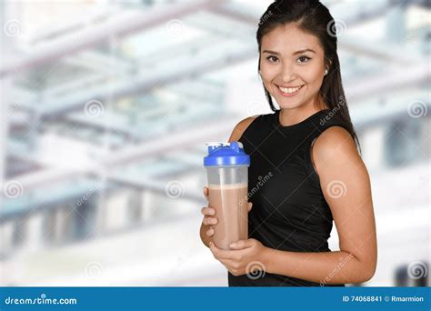 Woman with Protein Shake stock image. Image of workout - 74068841