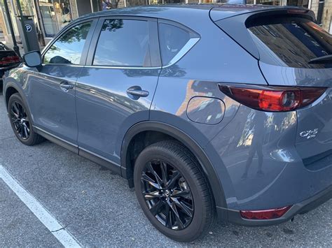 My 2021 Mazda CX-5 Carbon Edition Turbo AWD after a nice car wash. Man I just love this car ...