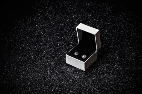 Premium Photo | Pair of earrings