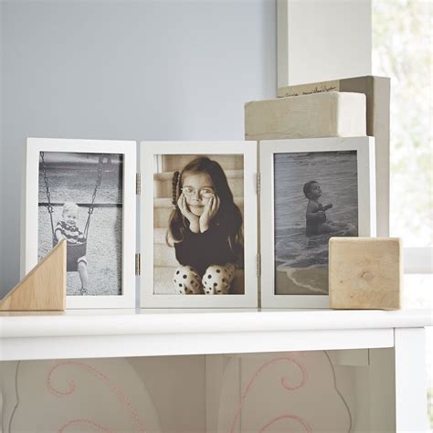 Bi Fold Picture Frame Stands On Floor