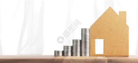 房地产投资和住房抵押房贷金融概念资金硬币堆叠式钱花板高清图片下载-正版图片504561606-摄图网