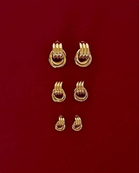Pin by Anita Silva on Essential Brand in 2025 | Jewelry trends, Vintage inspired earrings, Knot ...