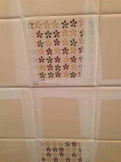 Remodelaholic | A $170 Bathroom Makeover with Painted Tile