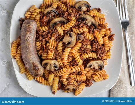 Rotini Pasta with a Meat Sauce and Italian Sausage Stock Image - Image ...