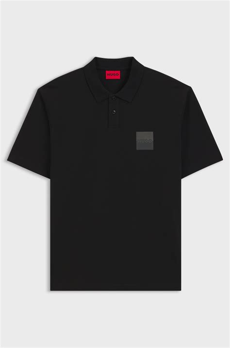 HUGO - Relaxed-fit polo shirt in cotton with split logo - Black
