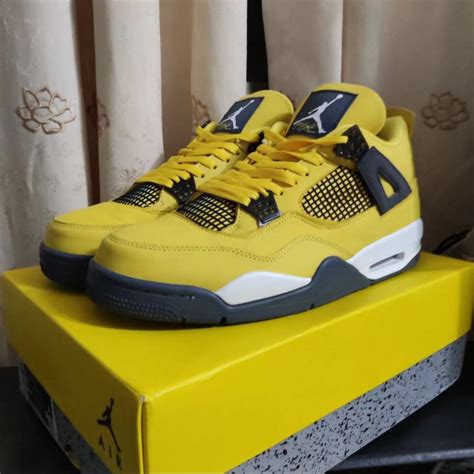 Jordan Air Jordan 4 retro "tour yellow" man's shoes - Depop