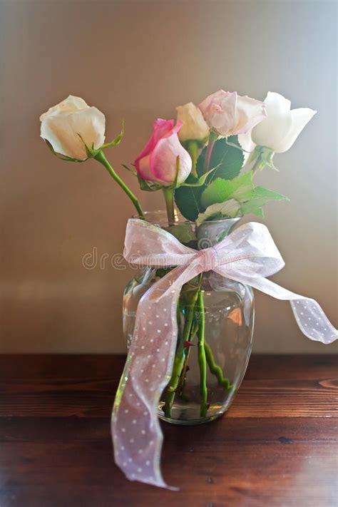 Roses in glass vase stock photo. Image of glass, retro - 45324184