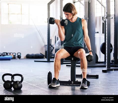 Handsome bodybuilder sitting on bench hi-res stock photography and ...