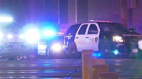 Police chase ends with driver stuck on railroad tracks in downtown ...