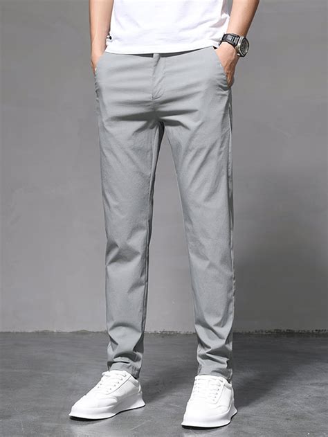 Men Solid Slant Pocket Tapered Trousers | Mens pants, Men's korean ...