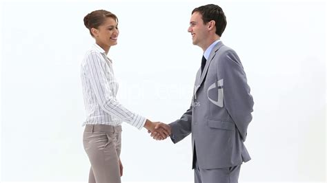 Two business people shaking hands: Lizenzfreie Stock Videos und Clips