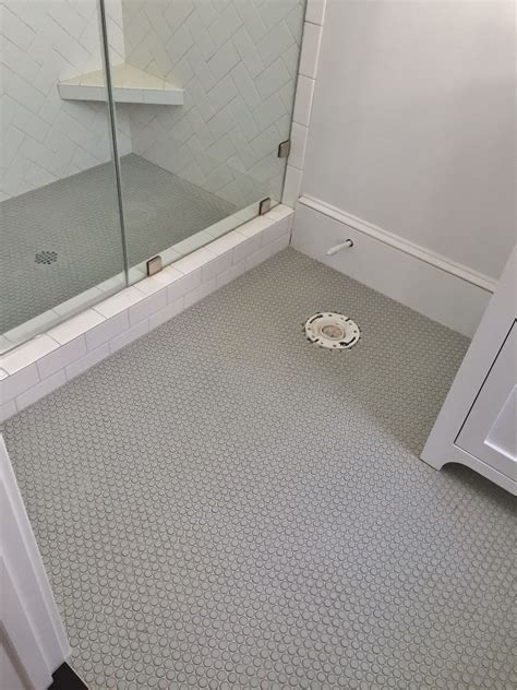 Gray Penny Round and White Subway Tile Bathroom Design