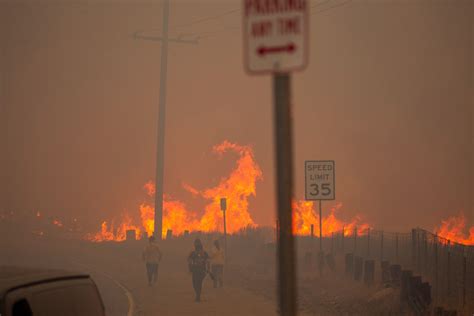 In photos: New wildfire explodes near Los Angeles, forces evacuations ...