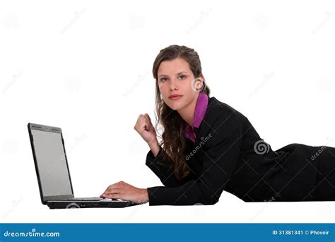Businesswoman Lying On Lilo And Typing On Laptop Royalty-Free Stock ...