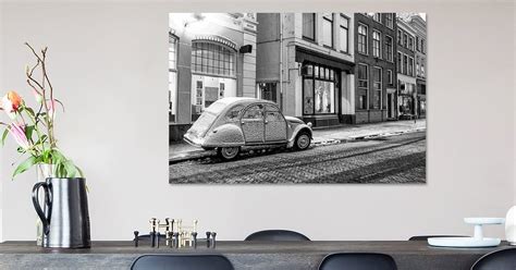 Classic French Citroën 2CV car parked on the side of the street in the ...