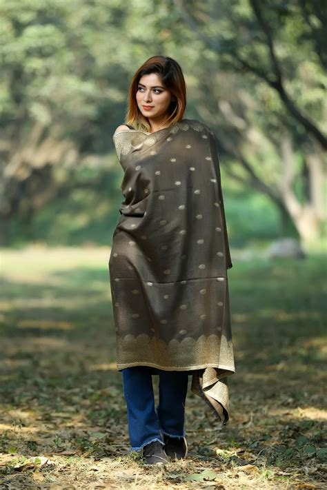 Classy metallic olive green colour zari shawl defines feminism