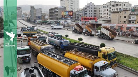 Bus, truck drivers block Lebanon roads in economy protest