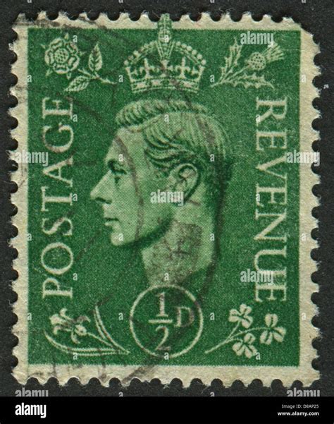 A stamp printed in UK shows image of the George VI (Albert Frederick ...