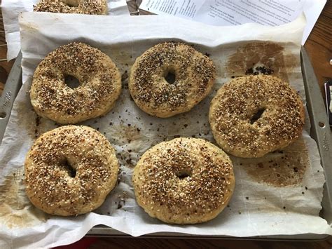 First time making bagels! I over proofed, so they're very flat. They ...