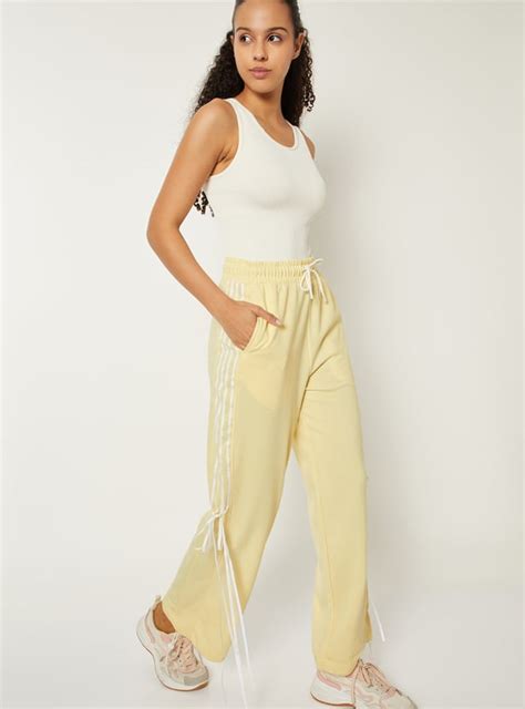 Buy Women Side Striped Track Pants Online at just Rs. 899.0 ...
