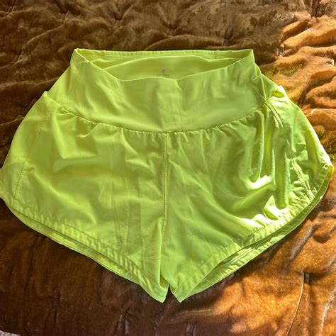 Neon green running shorts purchased from Amazon. No... - Depop