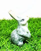 Image result for Peter Rabbit Figurines