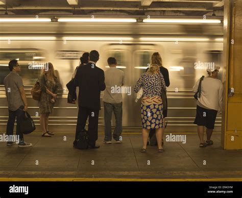 Commuters on the subway platform at Jay St./MetroTech, Brooklyn, NY ...
