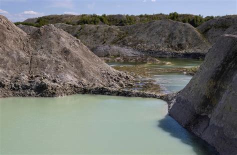 Natural water at the foot of the grassy old and new chalk quarries ...