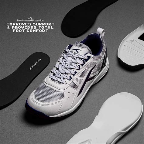 Hundred RAZE Unisex Badminton Shoes (White/Navy) – Sportswing.in