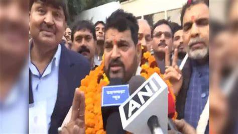 Brij Bhushan celebrates after his aide Sanjay Singh elected WFI president