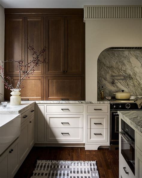 ATLANTA INTERIOR DESIGNER on Instagram: "Dark-stained wood upper cabinets mixed with light ...