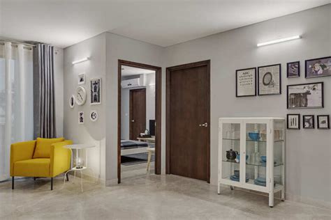 In this 4BHK the colour grey is the hero, while yellow brightens things ...