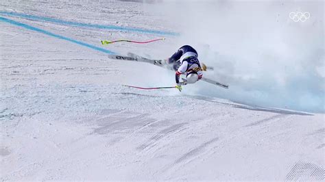 United States' Lindsey Vonn crashes into a gate during an alpine ski women's downhill race, at the 2026 Winter Olympics, in Cortina d'Ampezzo, Italy, Sunday, Feb. 8, 2026. (AP Photo/Jacquelyn Martin)